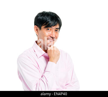 Homme confiant et permanent qui envisagent de Banque D'Images