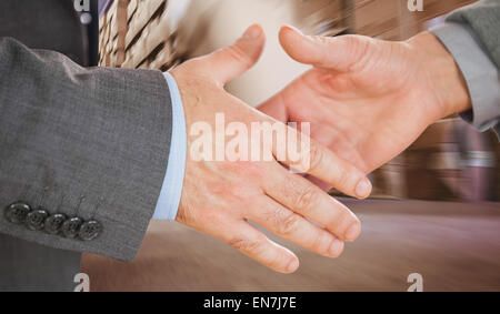 Image composite de deux personnes allant à leur serrer la main Banque D'Images