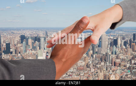 Image composite des gens d'affaires aller à serrer la main Banque D'Images