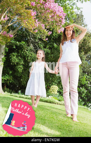 Image composite de poussin avec brouette de coeurs Banque D'Images