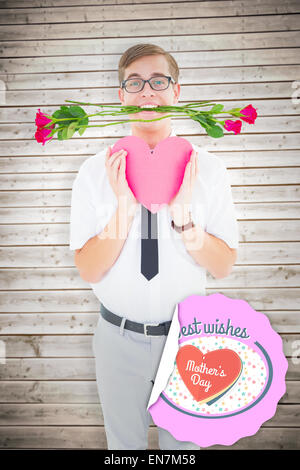 Image composite de hipster geek holding roses rouges et une carte coeur Banque D'Images