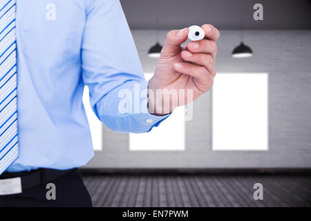 Composite image of man avec le marqueur Banque D'Images