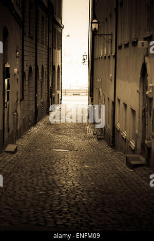 Ruelle pavée avec rustique coloré road, Stockholm - Suède Banque D'Images