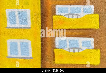 Détail d'un naïf photo sur le mur peint par un enfant dans l'éclat des couleurs Banque D'Images