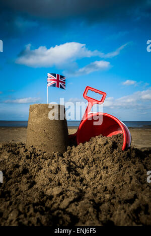 Sandcastle britannique avec la benne et la cosse Banque D'Images