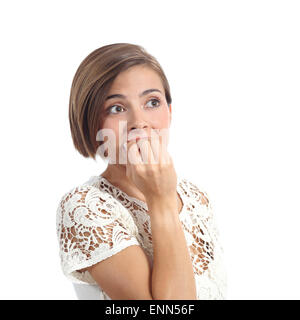 Worried woman biting nails nerveux isolé sur fond blanc Banque D'Images