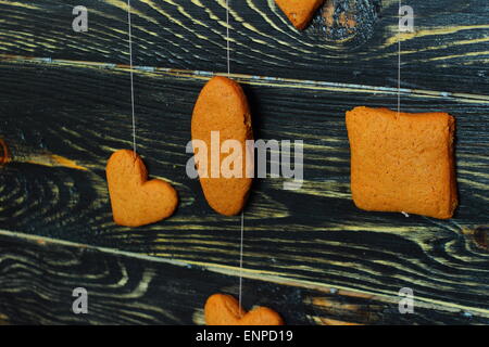 Accrocher les cookies en forme de cœur, ovale, carré Banque D'Images