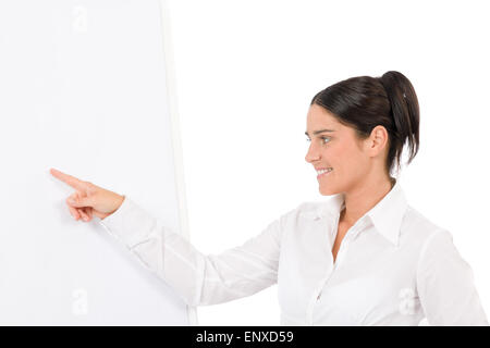 Happy businesswoman pointing at tableau vide Banque D'Images