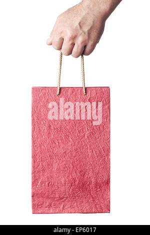 Homme hand holding red Shopping bag isolated Banque D'Images