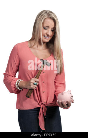 Woman holding piggy bank Banque D'Images