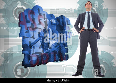 Composite image of businessman with hands on hips Banque D'Images