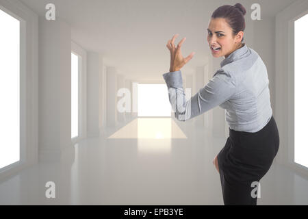 Image composite de businesswoman gesturing Banque D'Images