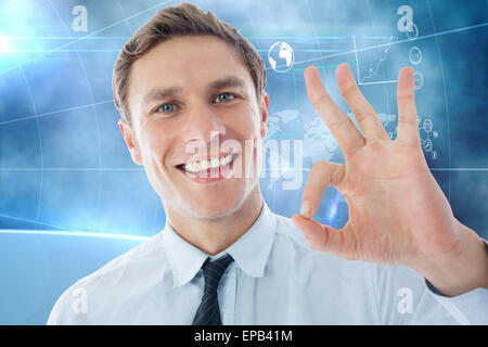 Image composite de businessman showing ok sign Banque D'Images