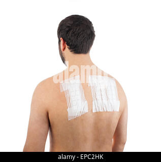 L'allergie cutanée Patch Test à l'arrière de l'homme Patient sur fond blanc Banque D'Images