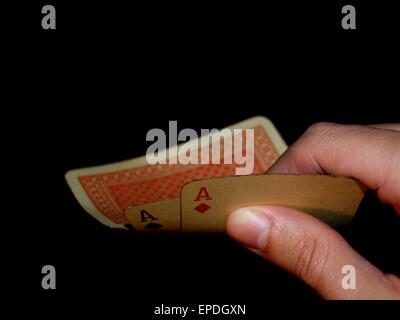 Paire d'Ace dans une main. Banque D'Images
