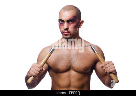 Homme avec nunchucks isolated on white Banque D'Images