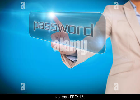 Businesswoman pointing to word password Banque D'Images