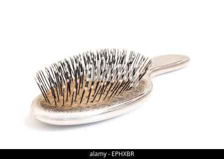 Close-up d'un utilisé hairbrush, isolé sur fond blanc Banque D'Images