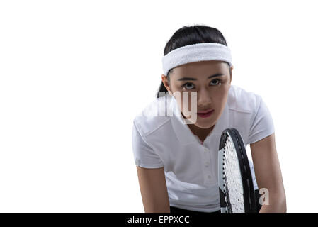 Les jeunes tennis player point dans le jeu Banque D'Images