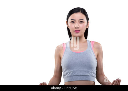 Young woman performing yoga Banque D'Images