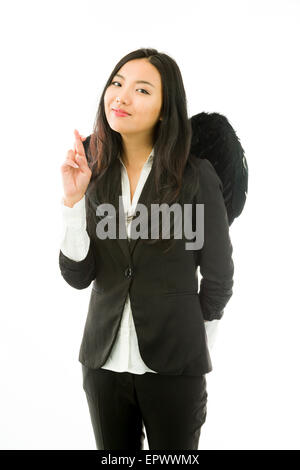 Jolie Asian young adult woman in anges et demon Banque D'Images