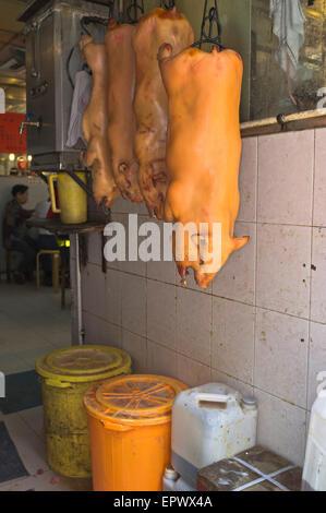 dh Queens Road West SHEUNG WAN HONG KONG rack de cochons de lait entrée au restaurant chinois Far East Pig Banque D'Images