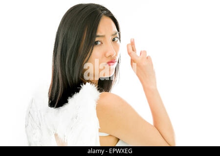 Jolie Asian young adult woman in anges et demon Banque D'Images