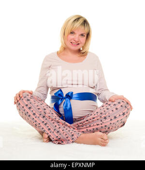 Femme enceinte avec bow bleu sur blanc Banque D'Images