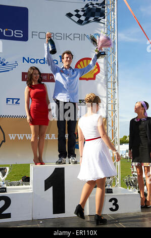 Aarhus, Danemark. 24 mai, 2015. Son Altesse Royale le Prince Joachim est une passionnée de la race driver. Dans sa course Lotus Cortina blanc, il l'a fait jusqu'à la tribune et a reçu un trophée cette journée ensoleillée en mai Crédit : Brian Bjeldbak/Alamy Live News Banque D'Images