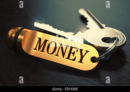 Concept de l'argent. Touches avec porte-clés d'or. Banque D'Images