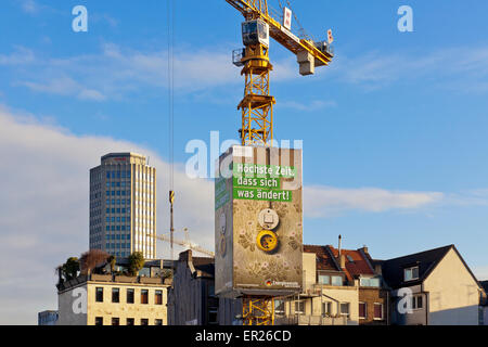 Europa, Deutschland, Nordrhein-Westfalen, Koeln, Baustelle, Kran der Firma mit Werbeplakat Wolff & Müller. Der sogenannte Skycr Banque D'Images