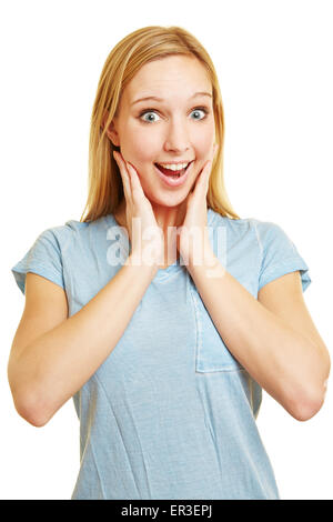 Jeune femme blonde à la agréablement surpris avec sa bouche ouverte Banque D'Images