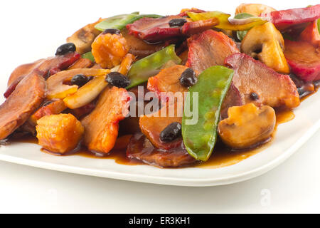 Sauté de porc chinois et les légumes chinois mélangés avec la sauce aux haricots noirs Banque D'Images