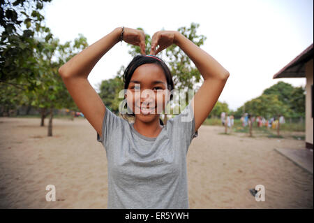 Fille à l'Orphelinat Cambodge Phare à Phnom Penh au Cambodge. Banque D'Images