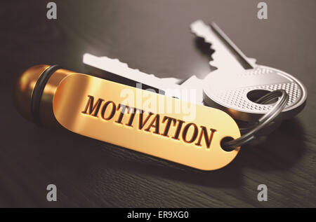 Les clés de la Motivation - Concept sur Trousseau d'or sur fond de bois noir. Vue rapprochée, Selective Focus, 3D Render. Tonique Im Banque D'Images