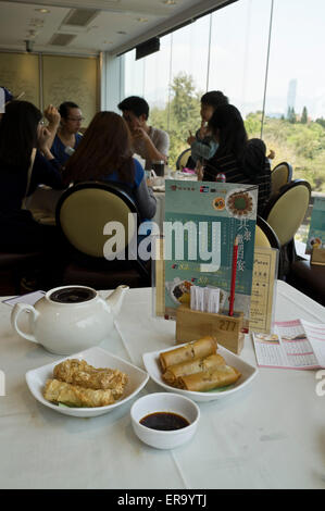 Dh RESTAURANT HONG KONG dim sum théière Table des plats chinois nourriture repas restaurant famille chine Banque D'Images