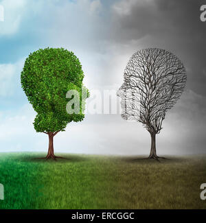 Les droits de l'humeur et troubles de l'émotion comme concept un arbre en forme de deux visages humains avec un demi plein de feuilles et de l'autre côté des branches vides comme une métaphore médicale pour contraste psychologique dans les sentiments. Banque D'Images