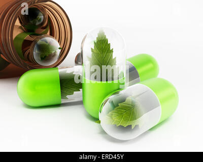 Phytothérapie concept avec des feuilles à l'intérieur de pilules. Banque D'Images