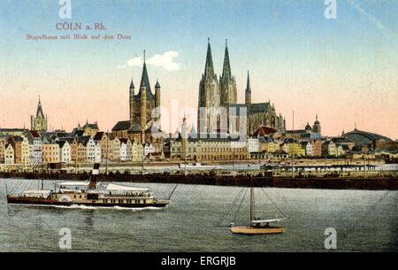 Cologne, Allemagne, début du xxe siècle. Voir l'affiche avec les flèches de la cathédrale2 donnant sur le Rhin, les bateaux . Köln, Banque D'Images