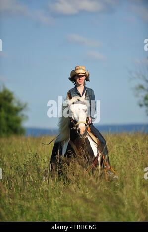 Femme à cheval Banque D'Images