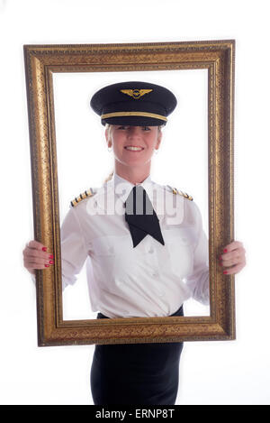 Châssis et portrait d'une femme en uniforme de pilote de ligne Banque D'Images