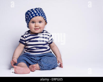 Smiling baby dans Mignon équipement Banque D'Images