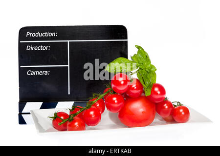 Histoire - Tomates Tomates et clapet du film sur scène Banque D'Images