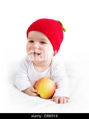 Bébé de sept mois aux pommes Banque D'Images