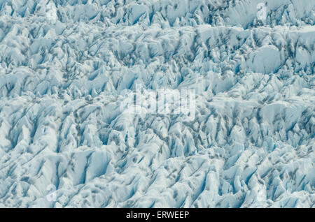 Surface texturée blanc et bleu d'un glacier au Groenland Banque D'Images