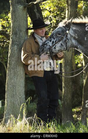 Et l'homme Appaloosa-Mix Banque D'Images