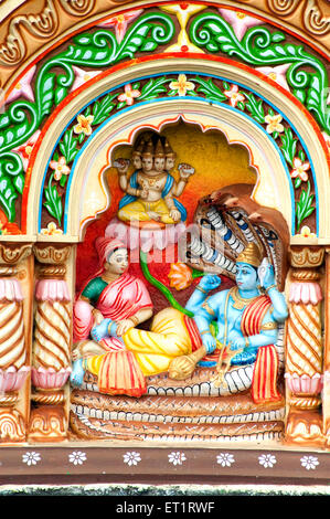 Niche décorative et de secours de Dieu datta sur le mur de yamai mandir à aundh ; ; ; Inde Maharashtra Satara Banque D'Images