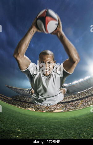 Joueur de rugby homme chauve Banque D'Images