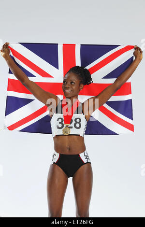 Athlète féminin tenant un drapeau britannique Banque D'Images