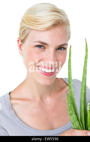 Attractive Woman holding aloe vera Banque D'Images